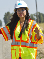 Flagging operator with high visibility safety apparel