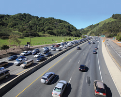 A photo depicting an overhead view of freeway traffic
